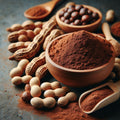 Tamarind seed powder in wooden bowl with scoop and seeds