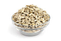 Bowl of sunflower seeds with pale beige kernels