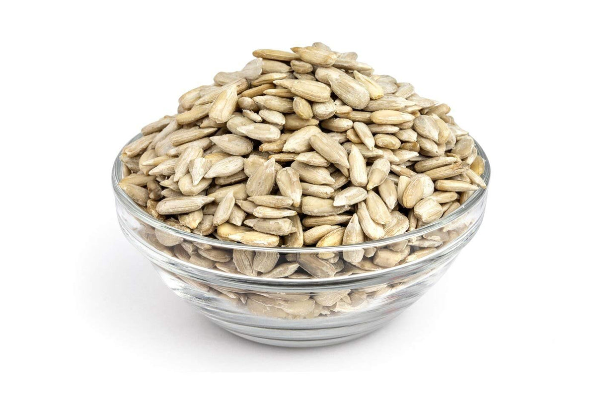 Bowl of sunflower seeds with pale beige kernels