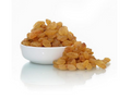 Yellow kishmish raisins in white bowl, loose piled