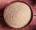 Bowl of little millet (samalu) grains, pale beige, filled and levelled