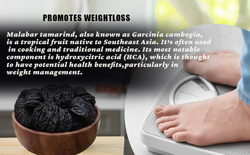 Dried dark tamarind fruits in a wooden bowl