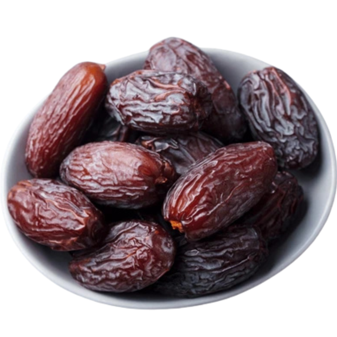 Bowl of jumbo Medjool dates, dark red wrinkled fruit