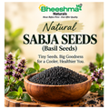 Basil seeds (sabja) in a wooden bowl, small dark black seeds