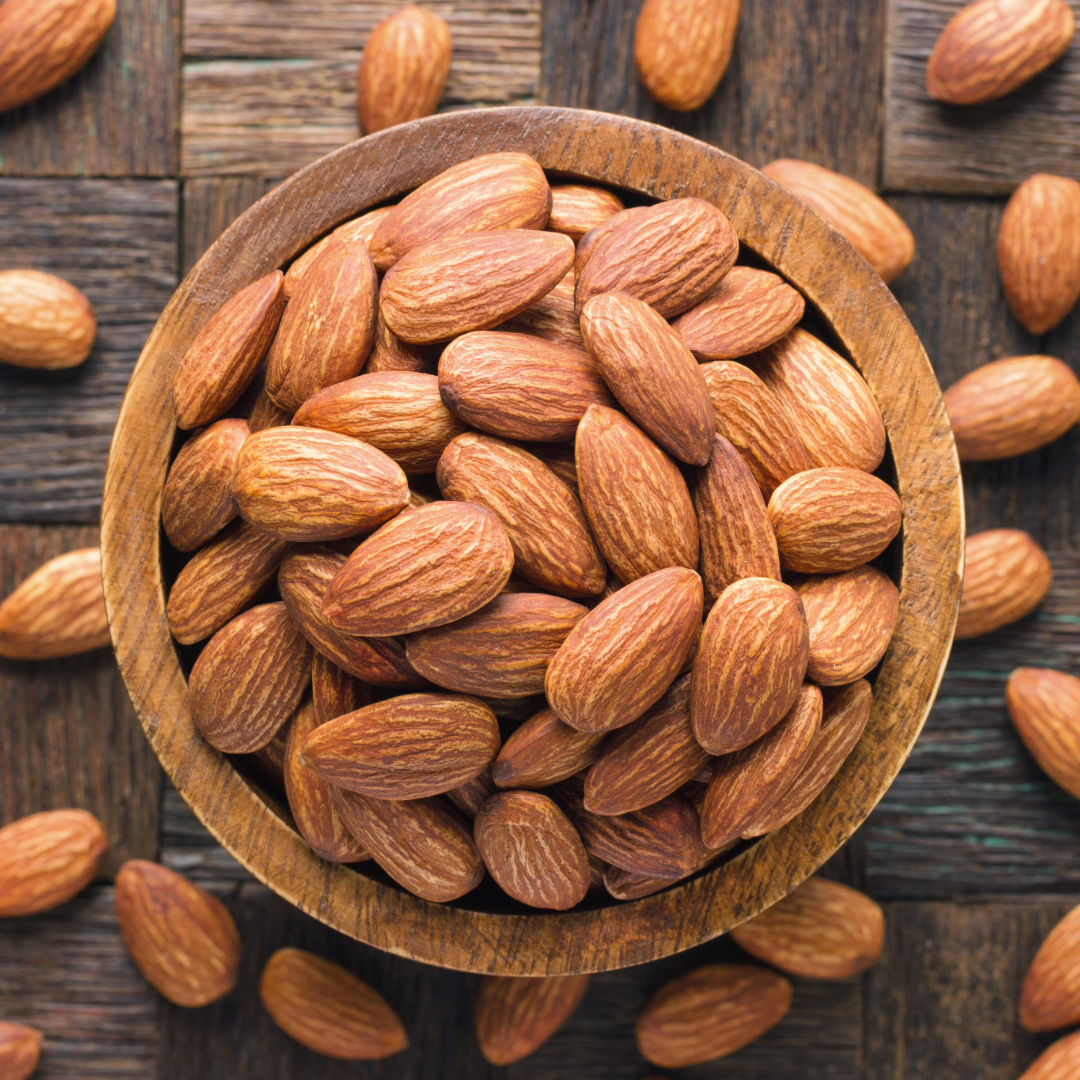 Almonds in wooden bowl, bold California almonds