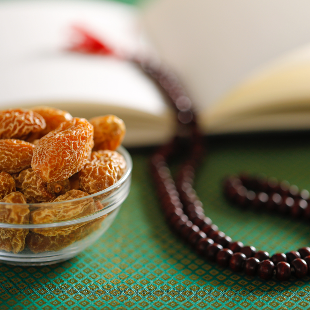 Yellow dried dates in a glass bowl
