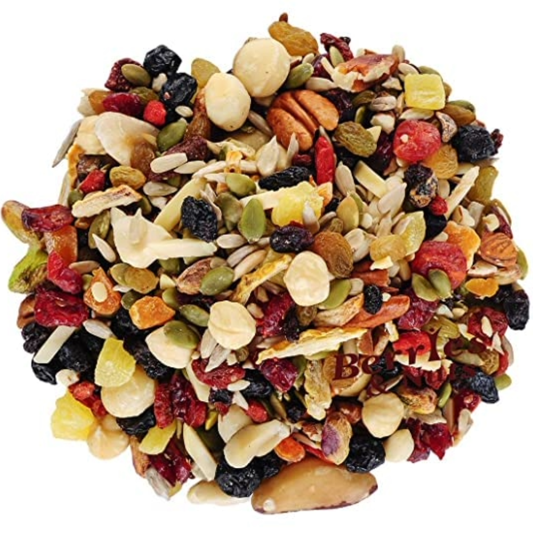 Assorted trail mix of dried fruits, nuts, and berries in a loose pile