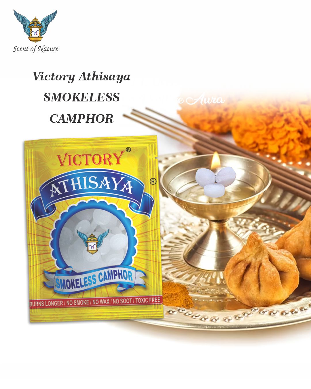 Victory Athisaya smokeless camphor packet beside brass puja bowl with camphor