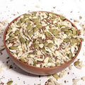 Roasted seed mix in a bowl, assorted roasted seeds and flakes