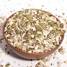 Roasted seed mix in a bowl, assorted roasted seeds and flakes