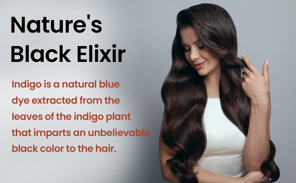 Woman with long dark hair using natural indigo hair color