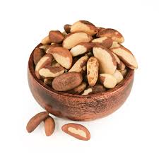 Brazil nuts in a small wooden bowl, whole kernels