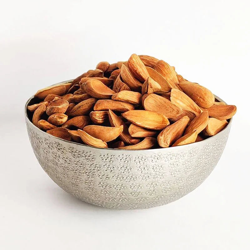 Iran Mamra almond kernels in metal bowl