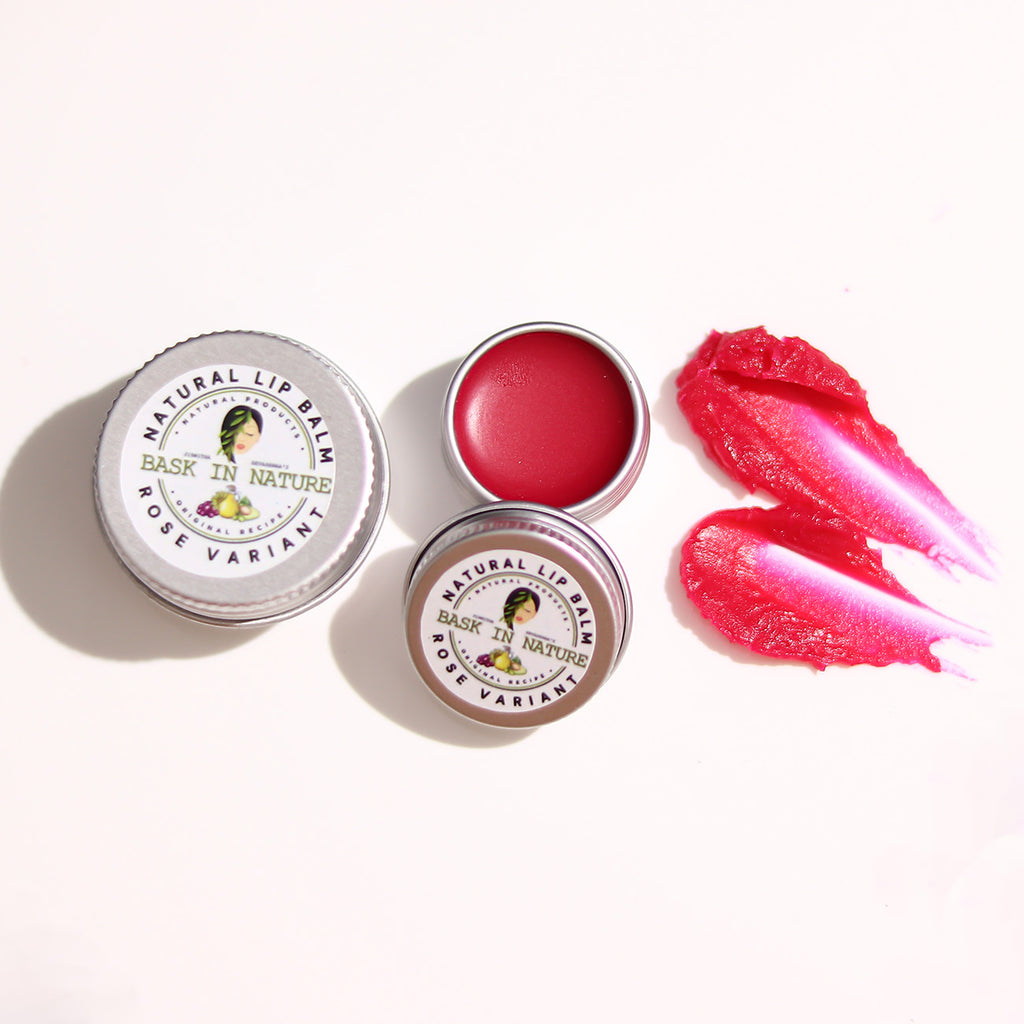Rose lip balm tins with red balm lip smear, small round metal containers